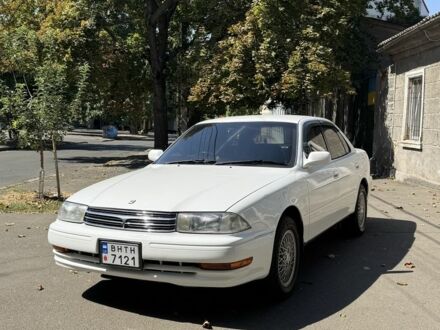 Белый Тойота Камри, объемом двигателя 1.8 л и пробегом 203 тыс. км за 3900 $, фото 1 на Automoto.ua