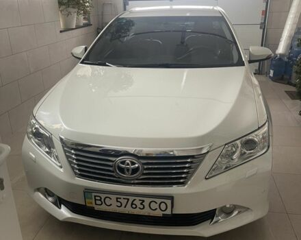 Белый Тойота Камри, объемом двигателя 2.5 л и пробегом 83 тыс. км за 16000 $, фото 1 на Automoto.ua