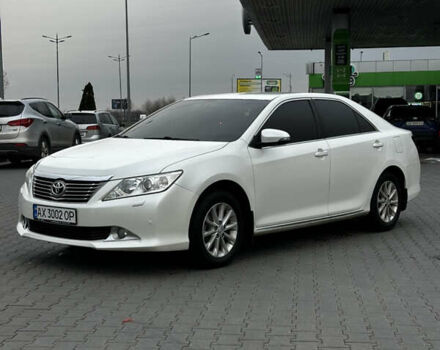 Білий Тойота Камрі, об'ємом двигуна 2.49 л та пробігом 233 тис. км за 12700 $, фото 1 на Automoto.ua
