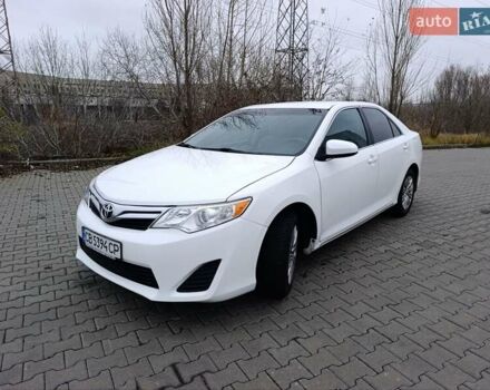Белый Тойота Камри, объемом двигателя 2.49 л и пробегом 174 тыс. км за 9700 $, фото 1 на Automoto.ua