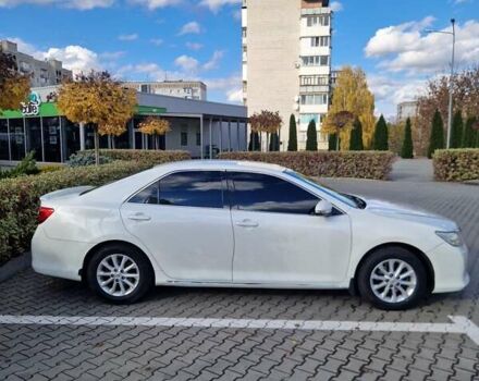 Белый Тойота Камри, объемом двигателя 2.4 л и пробегом 285 тыс. км за 13500 $, фото 1 на Automoto.ua
