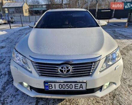 Белый Тойота Камри, объемом двигателя 2.5 л и пробегом 230 тыс. км за 11900 $, фото 1 на Automoto.ua