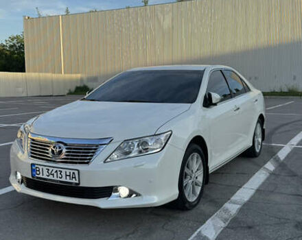 Белый Тойота Камри, объемом двигателя 2.5 л и пробегом 220 тыс. км за 14000 $, фото 1 на Automoto.ua
