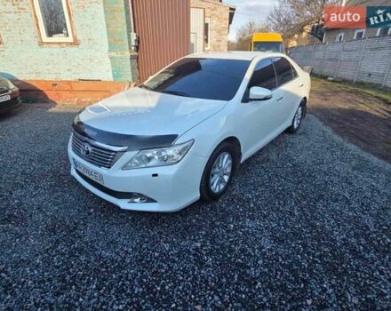 Белый Тойота Камри, объемом двигателя 2.5 л и пробегом 230 тыс. км за 11900 $, фото 1 на Automoto.ua