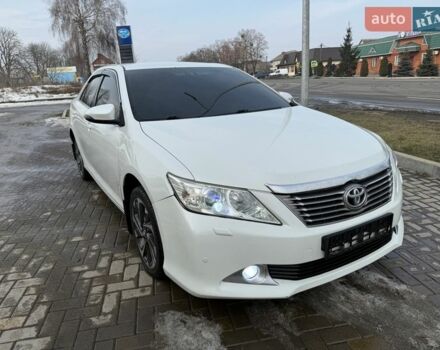 Белый Тойота Камри, объемом двигателя 2.5 л и пробегом 160 тыс. км за 11500 $, фото 1 на Automoto.ua