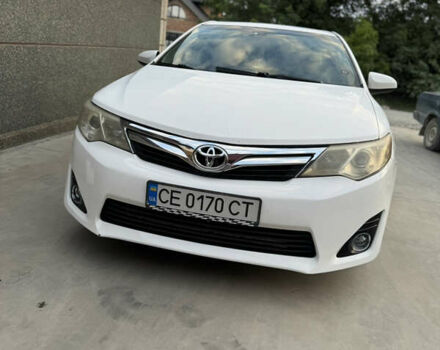 Белый Тойота Камри, объемом двигателя 2.49 л и пробегом 171 тыс. км за 10500 $, фото 1 на Automoto.ua