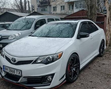 Белый Тойота Камри, объемом двигателя 2.5 л и пробегом 270 тыс. км за 8700 $, фото 1 на Automoto.ua