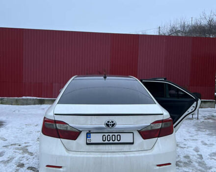 Белый Тойота Камри, объемом двигателя 2.36 л и пробегом 166 тыс. км за 12900 $, фото 1 на Automoto.ua