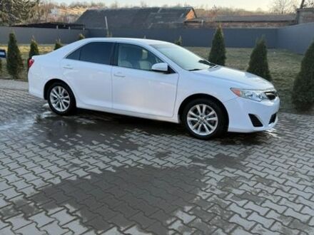 Белый Тойота Камри, объемом двигателя 2.5 л и пробегом 75 тыс. км за 15999 $, фото 1 на Automoto.ua