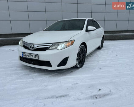 Білий Тойота Камрі, об'ємом двигуна 2.4 л та пробігом 199 тис. км за 9100 $, фото 1 на Automoto.ua