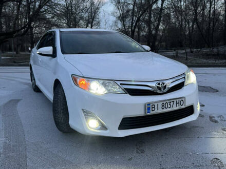 Білий Тойота Камрі, об'ємом двигуна 2.5 л та пробігом 190 тис. км за 13400 $, фото 1 на Automoto.ua