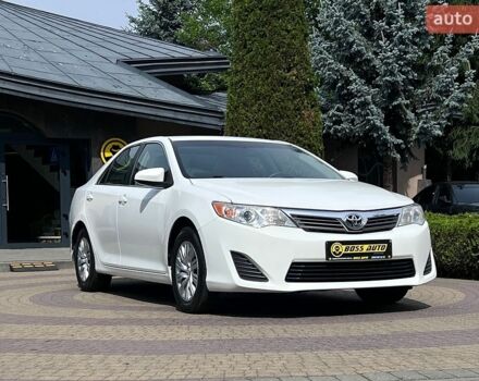 Белый Тойота Камри, объемом двигателя 2.49 л и пробегом 78 тыс. км за 15700 $, фото 1 на Automoto.ua