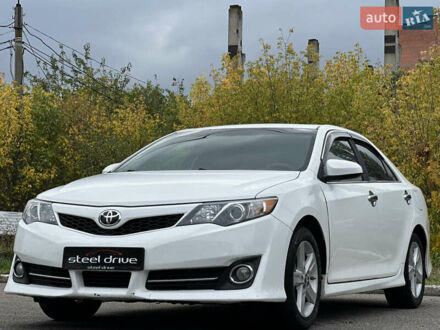 Белый Тойота Камри, объемом двигателя 2.49 л и пробегом 150 тыс. км за 13200 $, фото 1 на Automoto.ua