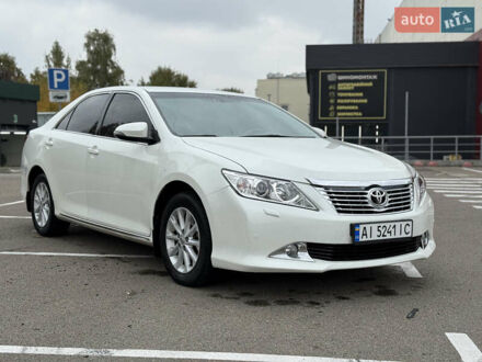 Білий Тойота Камрі, об'ємом двигуна 2.49 л та пробігом 250 тис. км за 13000 $, фото 1 на Automoto.ua