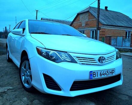 Белый Тойота Камри, объемом двигателя 2.5 л и пробегом 210 тыс. км за 8800 $, фото 1 на Automoto.ua