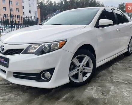 Белый Тойота Камри, объемом двигателя 2.49 л и пробегом 247 тыс. км за 10999 $, фото 1 на Automoto.ua
