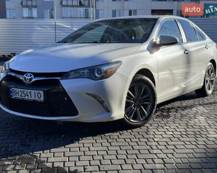 Белый Тойота Камри, объемом двигателя 2.49 л и пробегом 116 тыс. км за 14500 $, фото 1 на Automoto.ua