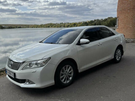Белый Тойота Камри, объемом двигателя 2.49 л и пробегом 297 тыс. км за 14400 $, фото 1 на Automoto.ua