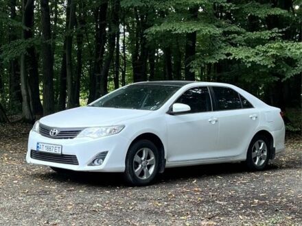 Белый Тойота Камри, объемом двигателя 2.5 л и пробегом 140 тыс. км за 11700 $, фото 1 на Automoto.ua