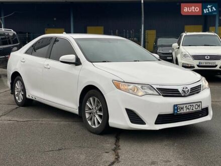 Білий Тойота Камрі, об'ємом двигуна 2.49 л та пробігом 252 тис. км за 8990 $, фото 1 на Automoto.ua