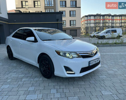 Білий Тойота Камрі, об'ємом двигуна 2.49 л та пробігом 112 тис. км за 13650 $, фото 1 на Automoto.ua