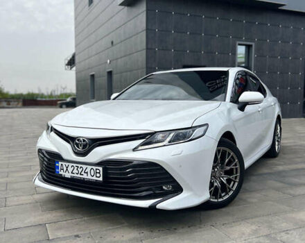 Белый Тойота Камри, объемом двигателя 2.49 л и пробегом 157 тыс. км за 22900 $, фото 1 на Automoto.ua