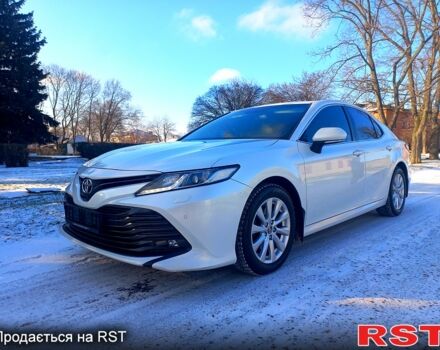 Белый Тойота Камри, объемом двигателя 2.5 л и пробегом 110 тыс. км за 23500 $, фото 1 на Automoto.ua