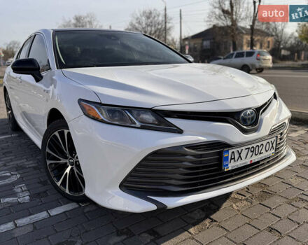 Белый Тойота Камри, объемом двигателя 2.49 л и пробегом 129 тыс. км за 21999 $, фото 1 на Automoto.ua