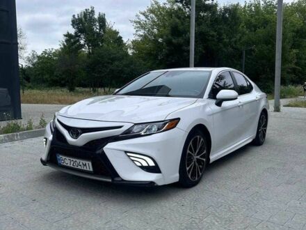 Белый Тойота Камри, объемом двигателя 2.5 л и пробегом 70 тыс. км за 22500 $, фото 1 на Automoto.ua