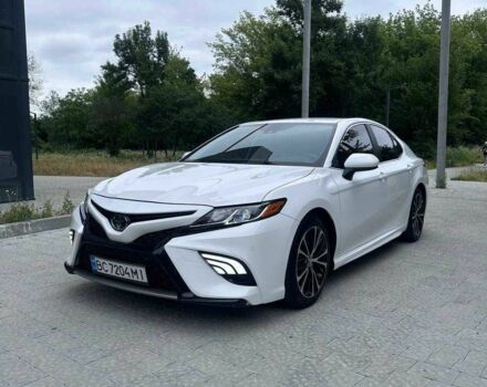 Белый Тойота Камри, объемом двигателя 2.5 л и пробегом 70 тыс. км за 22500 $, фото 1 на Automoto.ua