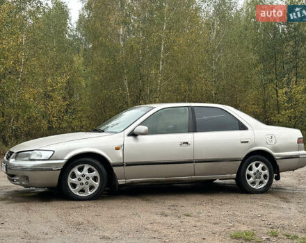 Бежевий Тойота Камрі, об'ємом двигуна 3 л та пробігом 360 тис. км за 2500 $, фото 4 на Automoto.ua