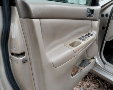 Бежевый Тойота Камри, объемом двигателя 2.4 л и пробегом 290 тыс. км за 5800 $, фото 12 на Automoto.ua