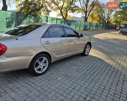 Бежевий Тойота Камрі, об'ємом двигуна 3 л та пробігом 438 тис. км за 5500 $, фото 17 на Automoto.ua