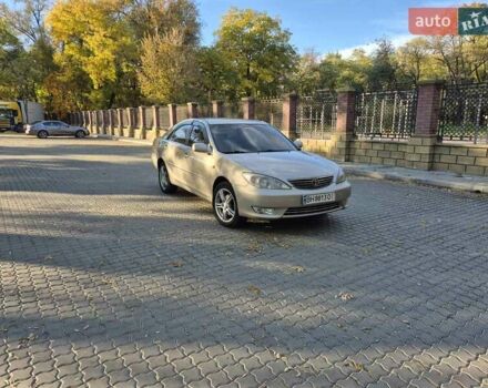 Бежевий Тойота Камрі, об'ємом двигуна 3 л та пробігом 438 тис. км за 5500 $, фото 1 на Automoto.ua