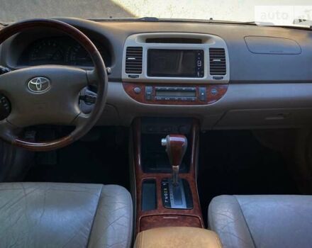 Бежевий Тойота Камрі, об'ємом двигуна 2.36 л та пробігом 231 тис. км за 6300 $, фото 5 на Automoto.ua