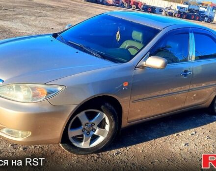 Бежевый Тойота Камри, объемом двигателя 2.4 л и пробегом 266 тыс. км за 5500 $, фото 4 на Automoto.ua