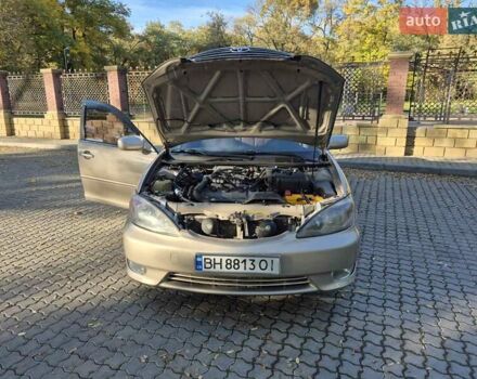 Бежевий Тойота Камрі, об'ємом двигуна 3 л та пробігом 438 тис. км за 5500 $, фото 27 на Automoto.ua