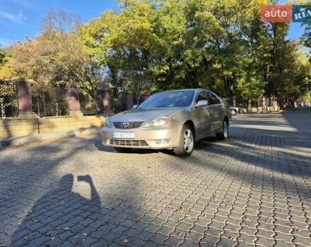 Бежевий Тойота Камрі, об'ємом двигуна 3 л та пробігом 438 тис. км за 5500 $, фото 23 на Automoto.ua