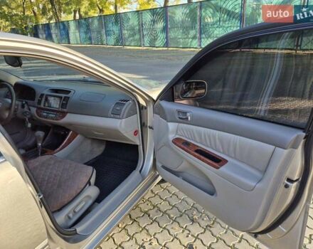 Бежевий Тойота Камрі, об'ємом двигуна 3 л та пробігом 438 тис. км за 5500 $, фото 36 на Automoto.ua