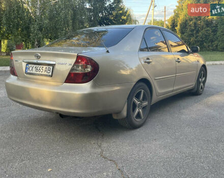 Бежевый Тойота Камри, объемом двигателя 3 л и пробегом 320 тыс. км за 5500 $, фото 6 на Automoto.ua