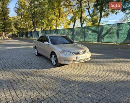 Бежевий Тойота Камрі, об'ємом двигуна 3 л та пробігом 438 тис. км за 5500 $, фото 11 на Automoto.ua