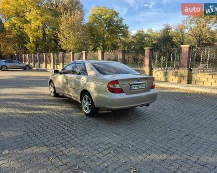 Бежевий Тойота Камрі, об'ємом двигуна 3 л та пробігом 438 тис. км за 5500 $, фото 19 на Automoto.ua