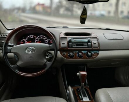 Бежевий Тойота Камрі, об'ємом двигуна 2.4 л та пробігом 354 тис. км за 4900 $, фото 6 на Automoto.ua