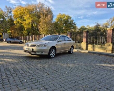 Бежевий Тойота Камрі, об'ємом двигуна 3 л та пробігом 438 тис. км за 5500 $, фото 13 на Automoto.ua