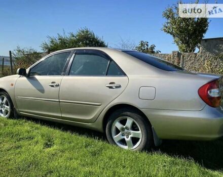 Бежевий Тойота Камрі, об'ємом двигуна 2.36 л та пробігом 231 тис. км за 6300 $, фото 2 на Automoto.ua