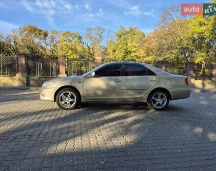 Бежевий Тойота Камрі, об'ємом двигуна 3 л та пробігом 438 тис. км за 5500 $, фото 26 на Automoto.ua