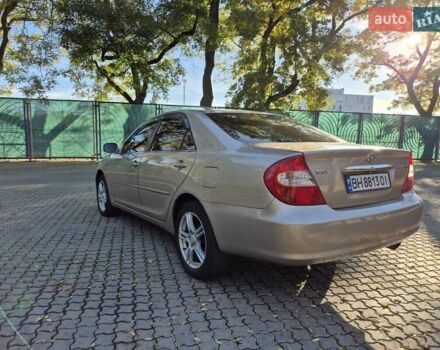Бежевий Тойота Камрі, об'ємом двигуна 3 л та пробігом 438 тис. км за 5500 $, фото 25 на Automoto.ua