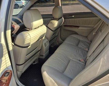 Бежевий Тойота Камрі, об'ємом двигуна 3 л та пробігом 438 тис. км за 5500 $, фото 38 на Automoto.ua