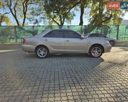 Бежевий Тойота Камрі, об'ємом двигуна 3 л та пробігом 438 тис. км за 5500 $, фото 24 на Automoto.ua