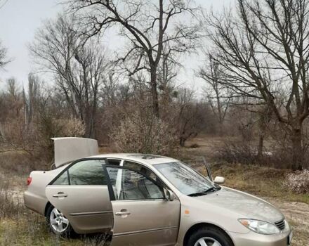 Бежевий Тойота Камрі, об'ємом двигуна 2.4 л та пробігом 299 тис. км за 6400 $, фото 24 на Automoto.ua